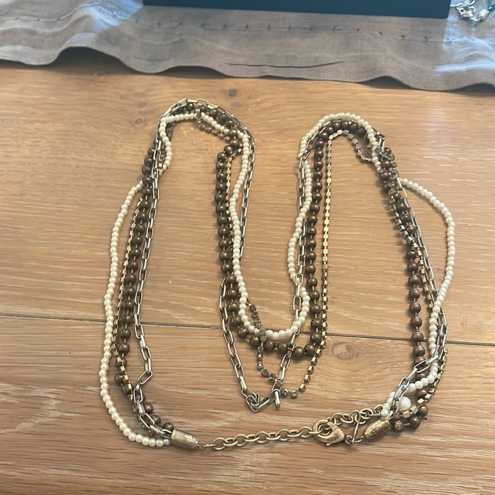 4 strand necklace.  Bling without the bulk
